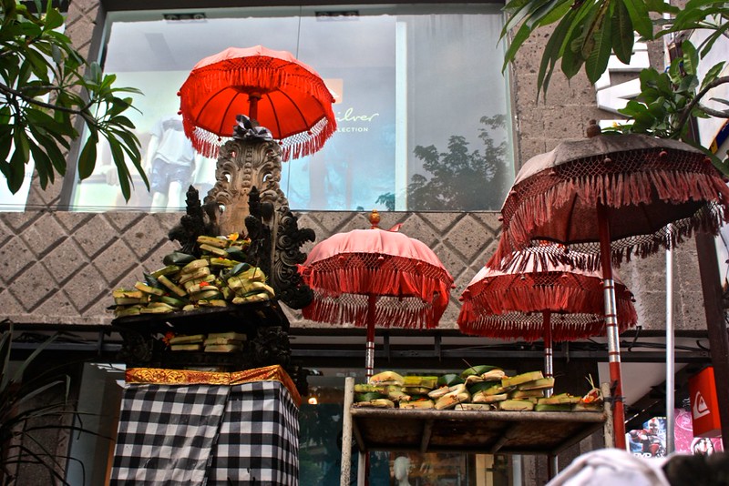 piles of offerings to what Lina calls the umbrella god