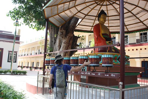spinning the prayer wheels in a Tibetan monastery
