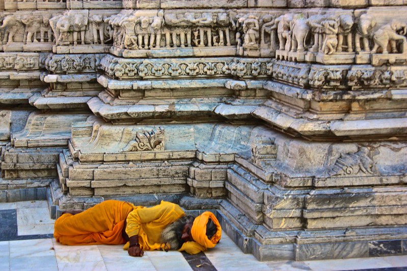 A Sadhu sleeps by the Jagdish Mandir A Sadhu sleeps by the Jagdish Mandir