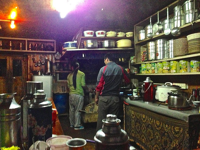 our gracious hosts cooking our dinner