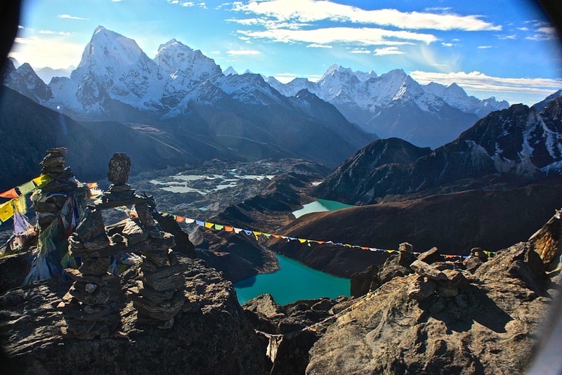 Prayer flags cut the Gokyo lakes at the top of Gokyo Ri Prayer flags cut the Gokyo lakes at the top of Gokyo Ri