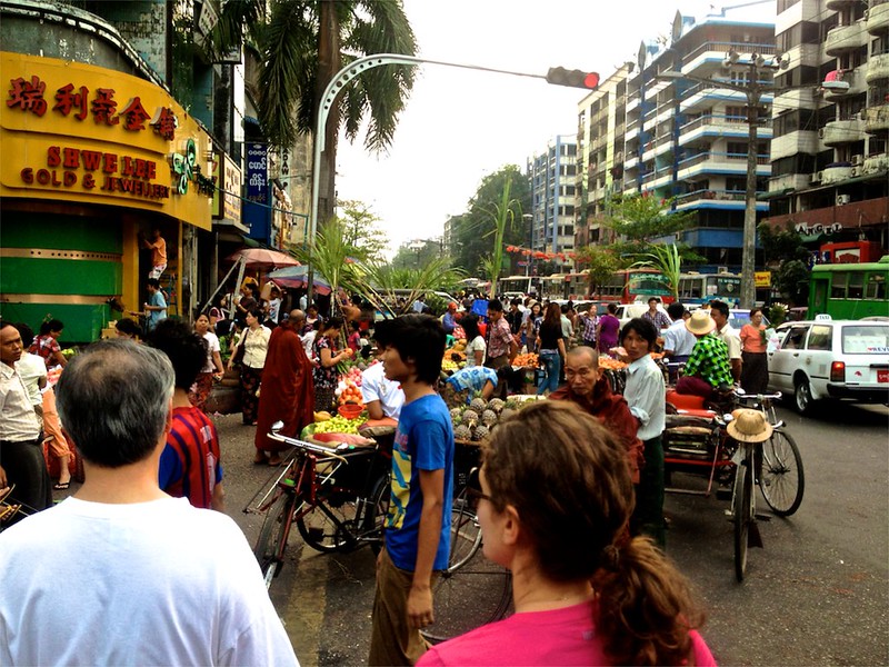 Traffic, palms, Lina, cars, buses and Monks Traffic, palms, Lina, cars, buses and Monks