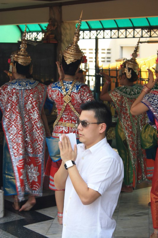 an offering of performance at Erawan Shrine. people worship this shrine of Brahma by hiring performers after they have good fortune an offering of performance at Erawan Shrine. people worship this shrine of Brahma by hiring performers after they have good fortune