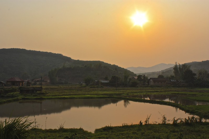 sunset over the outskirts of Nong Khiaw