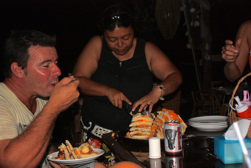 the most amazing dessert ever. It was Ashley's birthday (our new friend from Australia on the left). Koh Rong Samloem Villas were supposed to get a cake. Forgot. So they improvised. The result… Pancakes layered with cream and fruit. Amazing. the most amazing dessert ever. It was Ashley's birthday (our new friend from Australia on the left). Koh Rong Samloem Villas were supposed to get a cake. Forgot. So they improvised. The result… Pancakes layered with cream and fruit. Amazing.