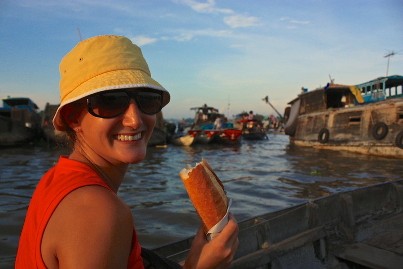 Lina enjoying fresh bread. Bought from a boat of course!