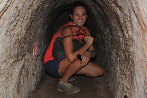 Lina in the Cu Chi tunnels… barely able to kneel