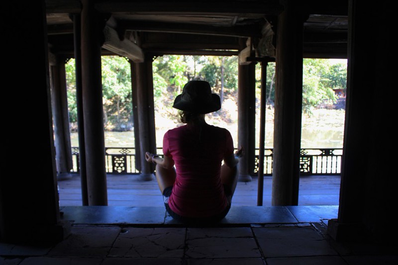 Lina meditating at the meditation house on the Tu Duc Tomb grounds Lina meditating at the meditation house on the Tu Duc Tomb grounds
